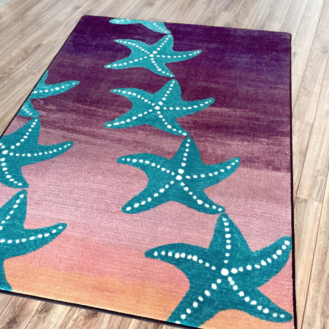 Celestial Charm for the Starry Night - Sunset Area Rug by Shore & Salt.